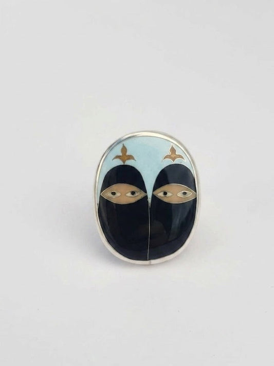RING WITH TWO FACES