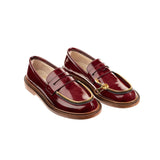red shiny leather moccasin with golden zipp