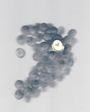 White Oval Ring with a Golden Heart