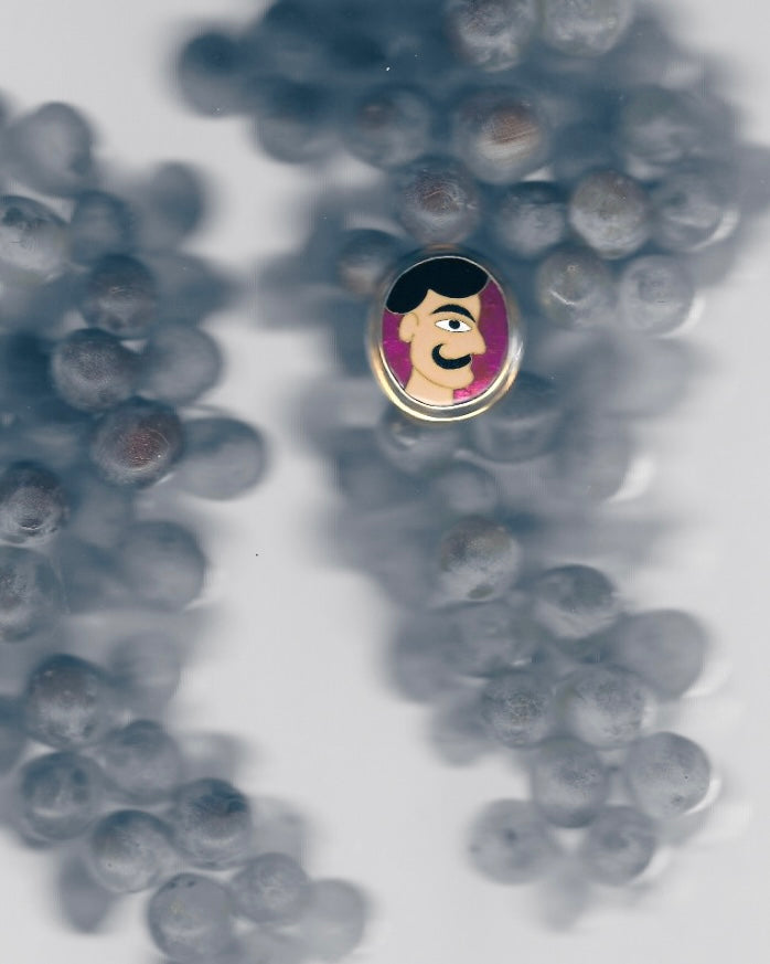 Pink Ring with Man’s Face