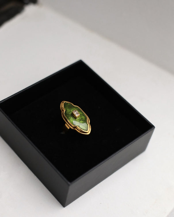Green ring with yellow stone