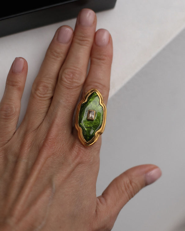 Green ring with yellow stone