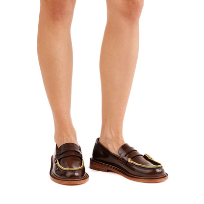 Brown mocassin with gold zipp