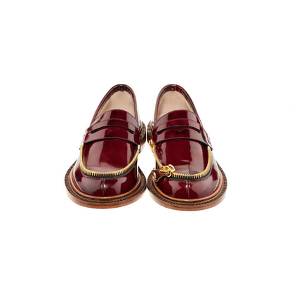 red shiny leather moccasin with golden zipp
