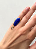 Blue oval ring with small Peral and stone