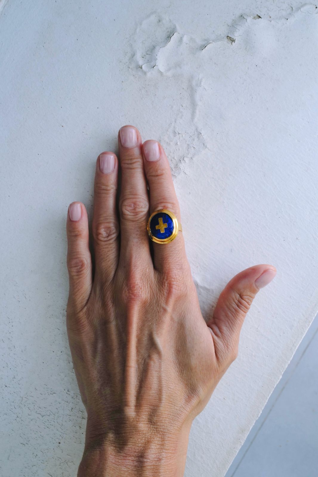 Blue ring with cross