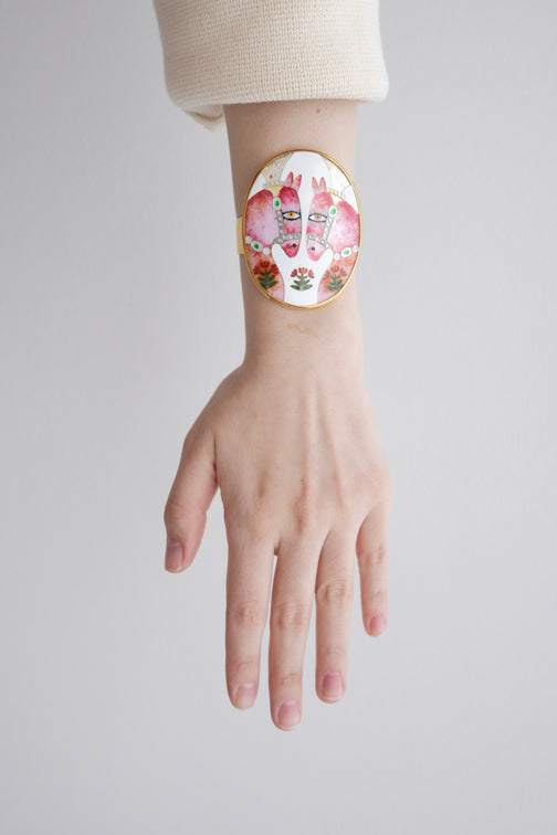 BRACELET WITH TWO PINK HORSES