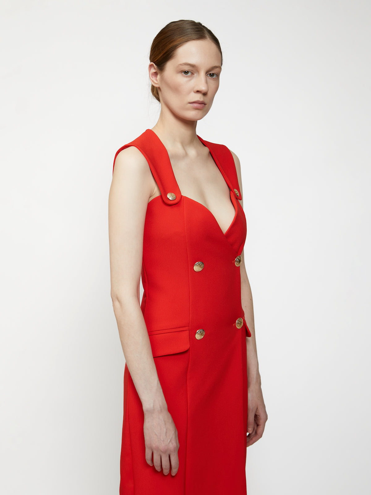 Red dress with golden buttons