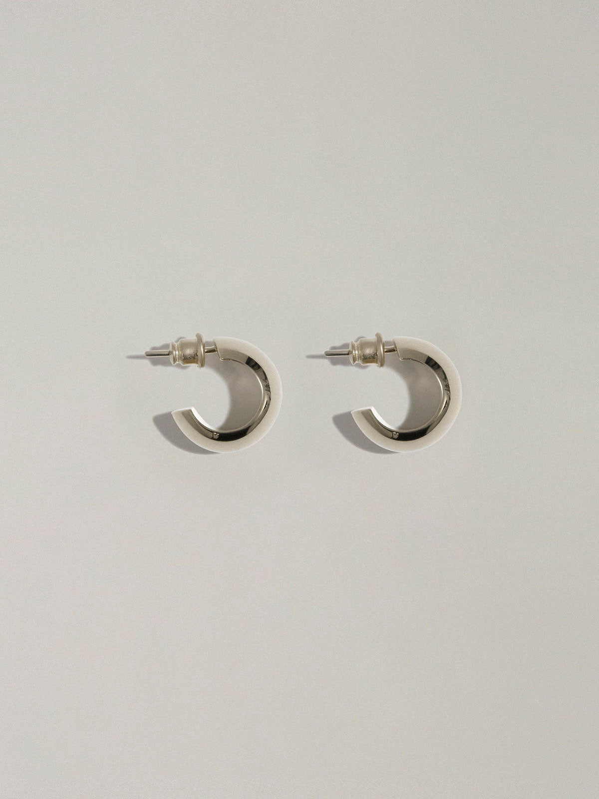 Small bold hoops in silver