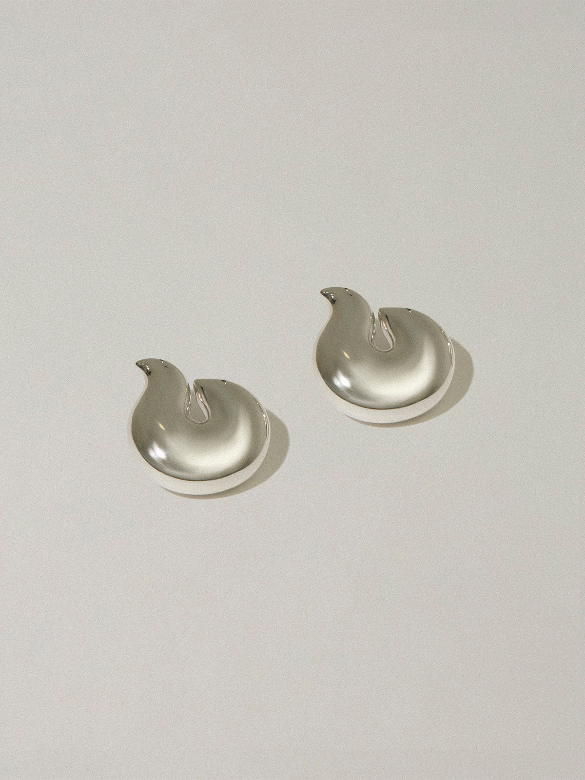 Soft flame silver earring